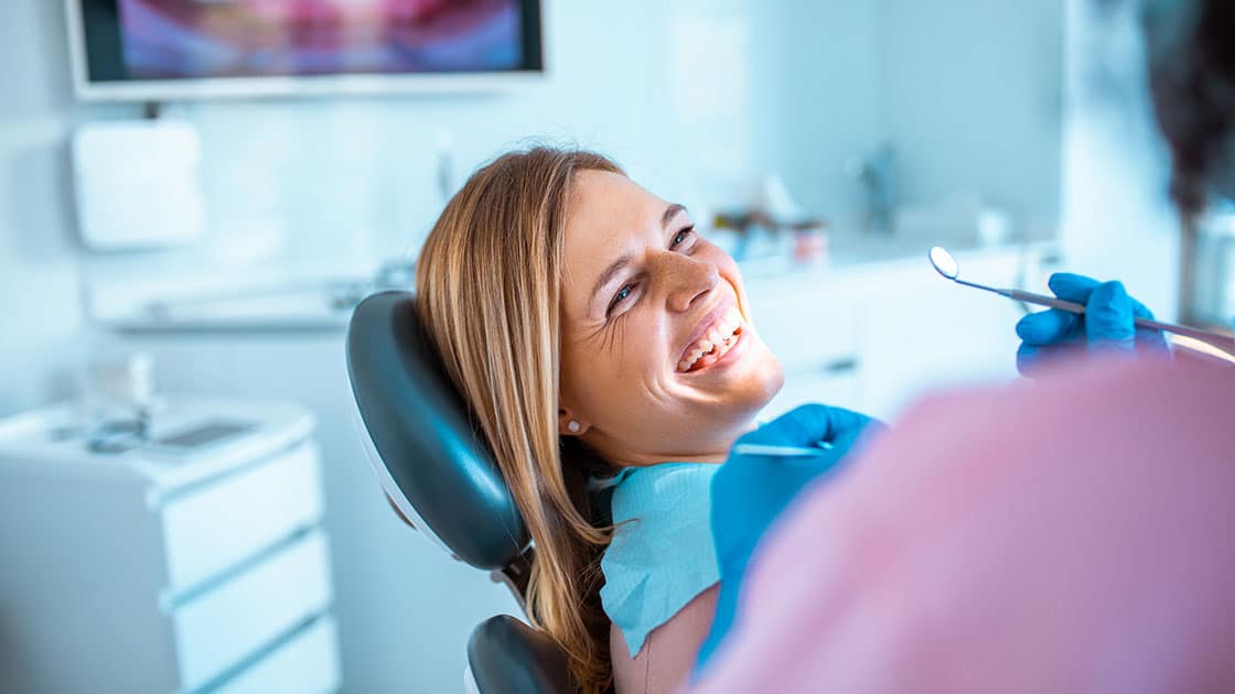 Woman Getting Her Teeth Cleaned